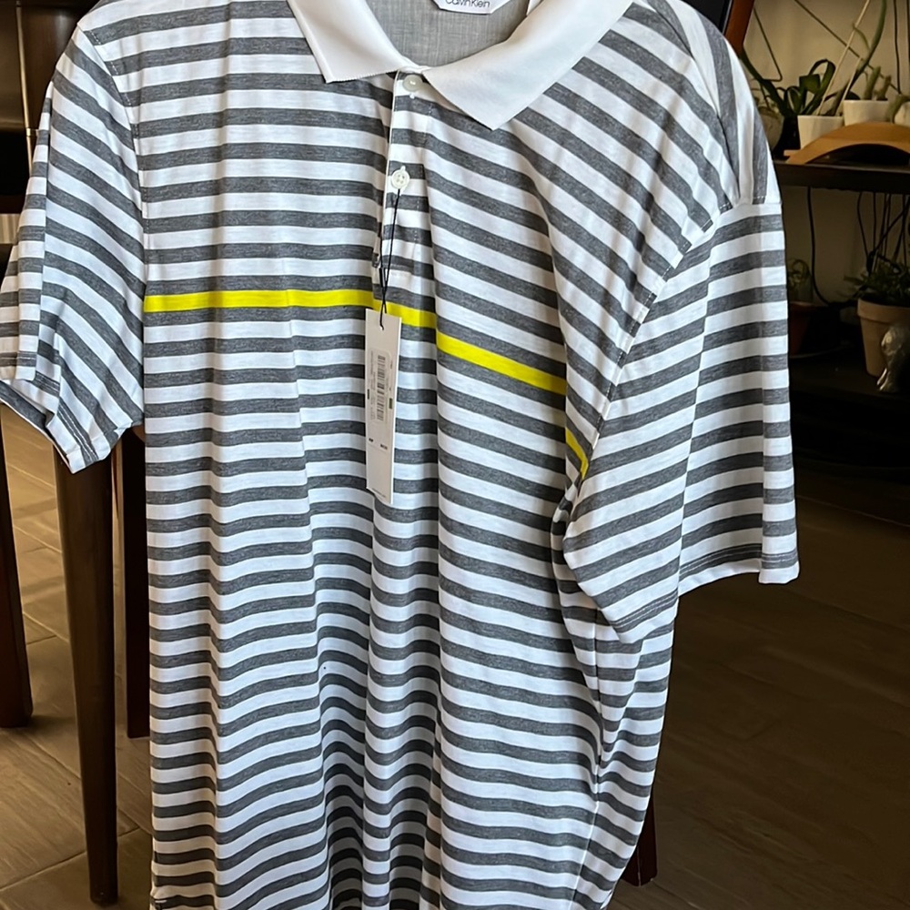Calvin Klein Mens polo short sleeve white vertical stripes snd a yellow strip